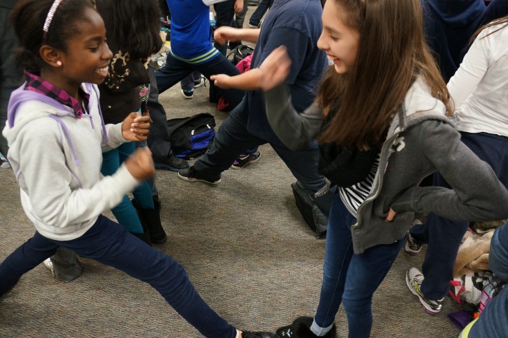 Students learn the new way to play Rock, Paper, Scissors...Splits!
