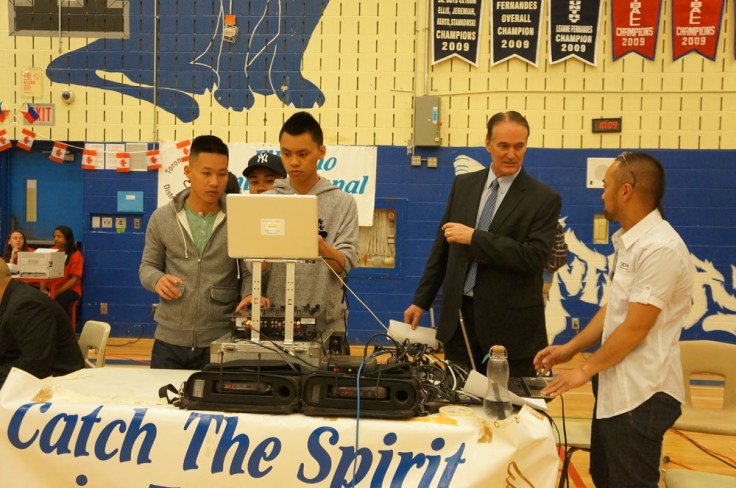 Above: Patrick and friends setting up the DJ booth and pumpin' the tunes to get everyone energized for the day.