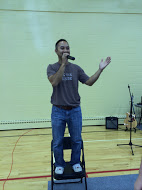 Mike is a bit to short to see above everyone's head so he needed a chair to lead the activity