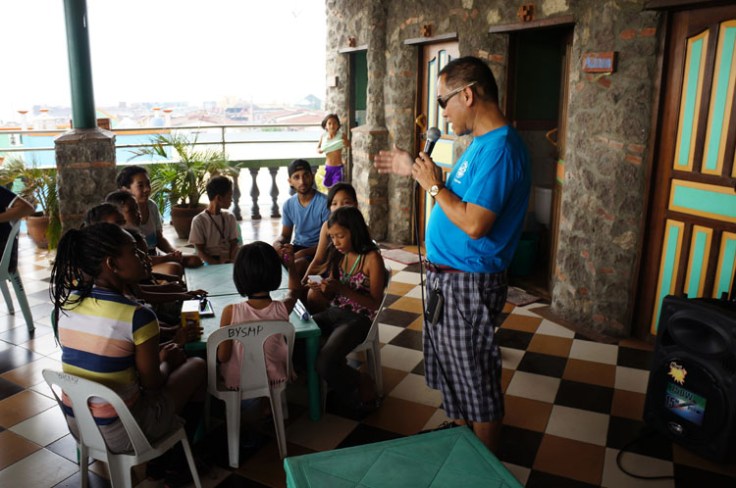 Michael Dad Bernie Consul leads us in grace before we all have lunch